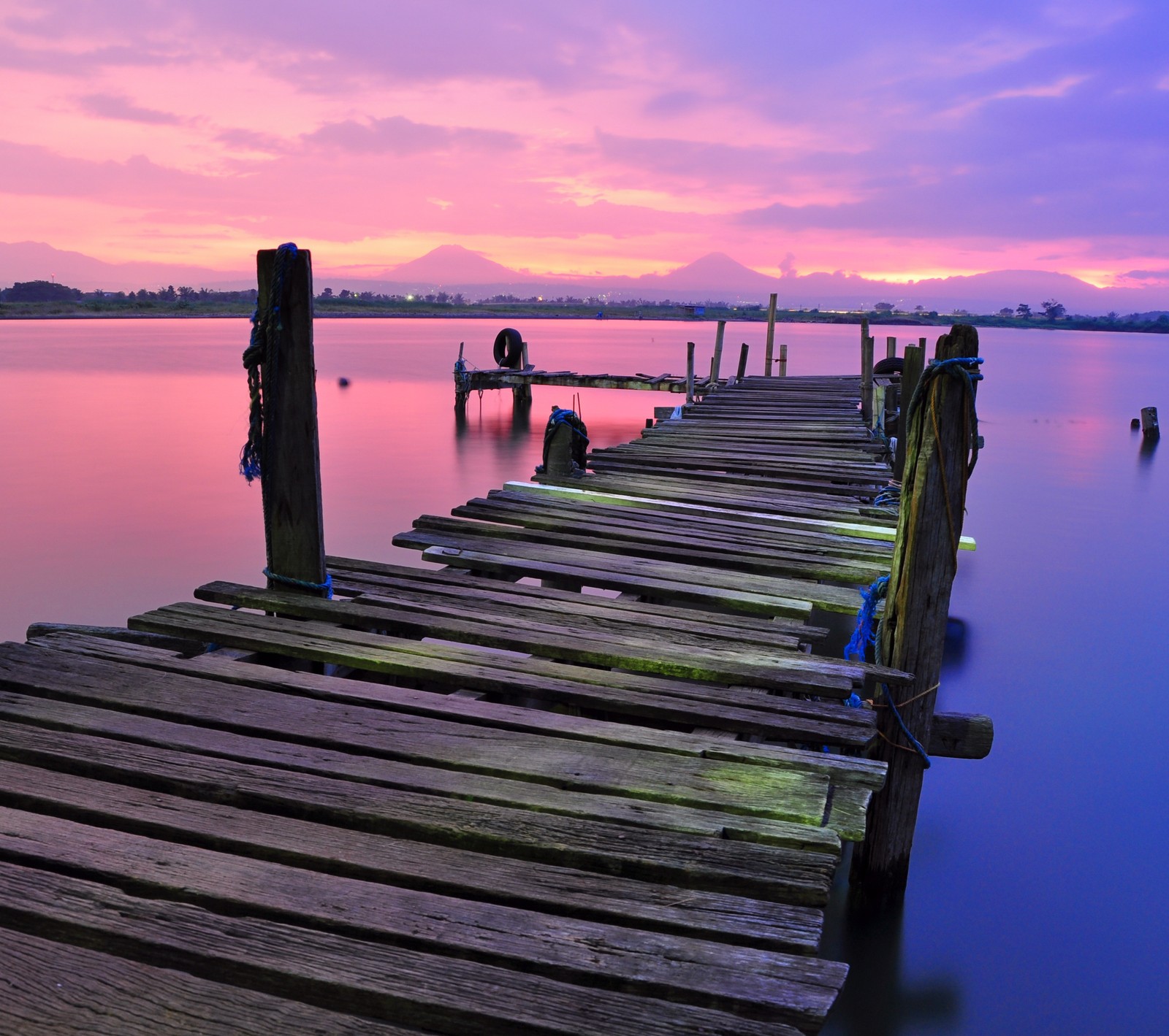 Arafed wooden pier with a boat in the water at sunset (beautiful, full hd, nature, wallpaper)