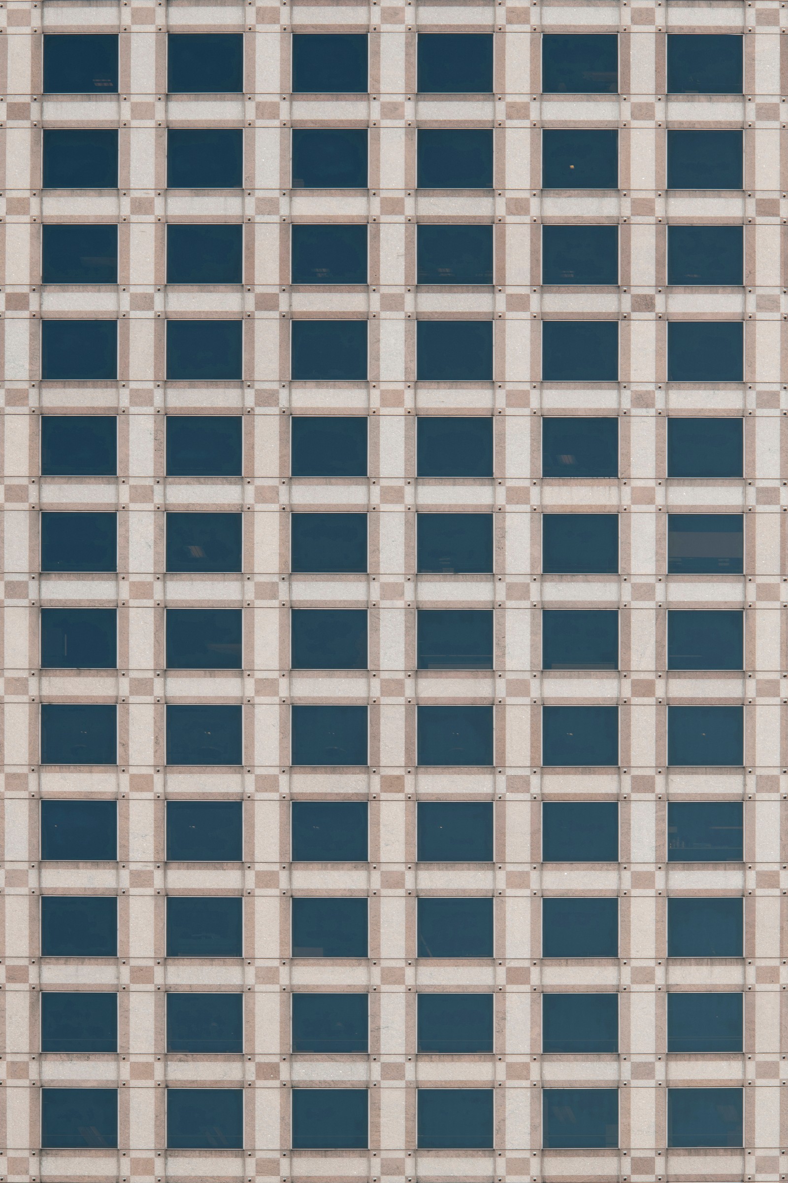 Arafed image of a building with a clock on the front of it (pattern, beige, architecture, square, rectangle)