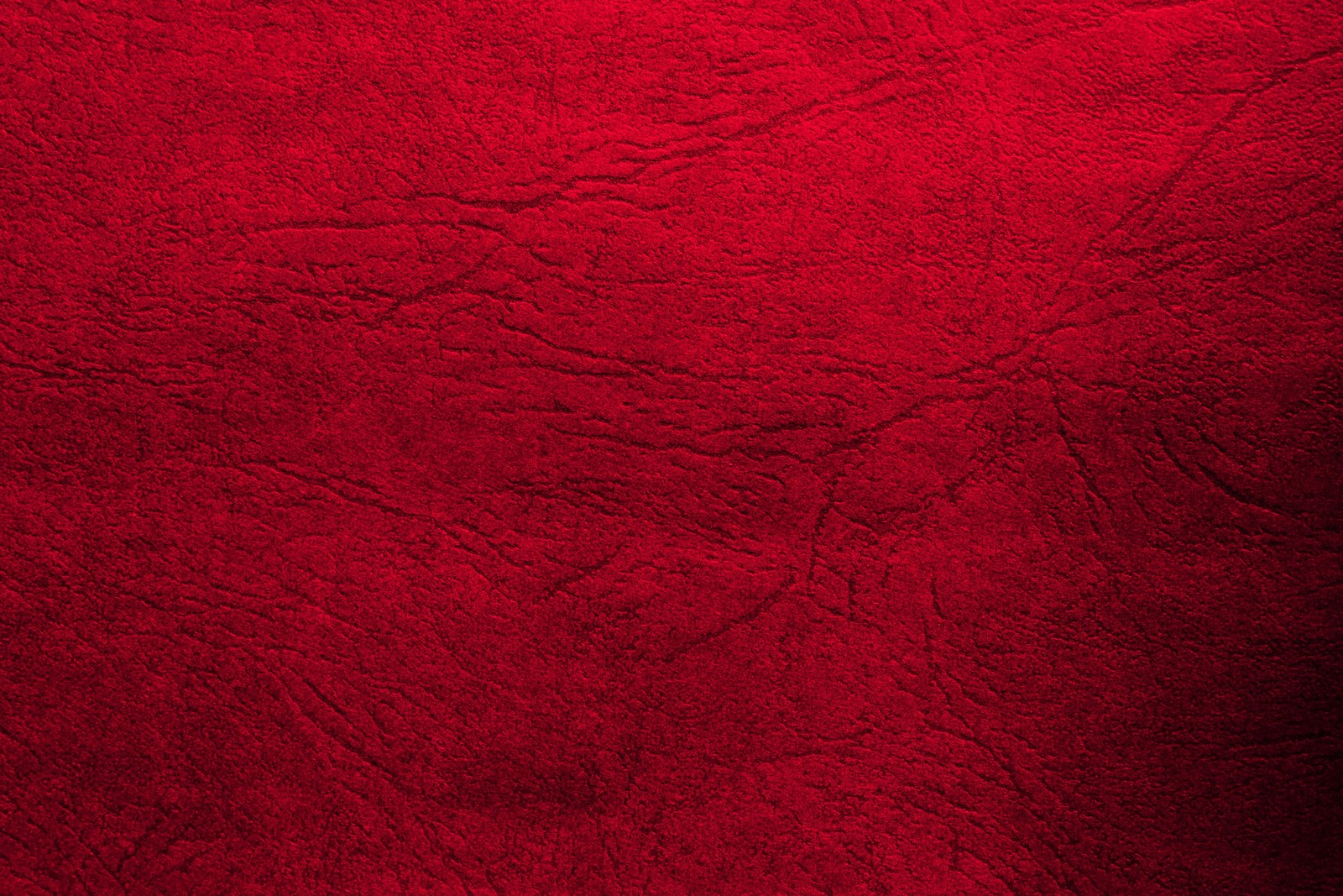 Fond en texture de cuir rouge avec une surface très lisse (texture, rouge, marron, magenta, textile)