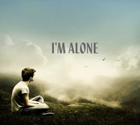 A solitary figure sits on a grassy hillside, gazing into a vast, misty landscape, with the phrase "I'M ALONE" prominently displayed.