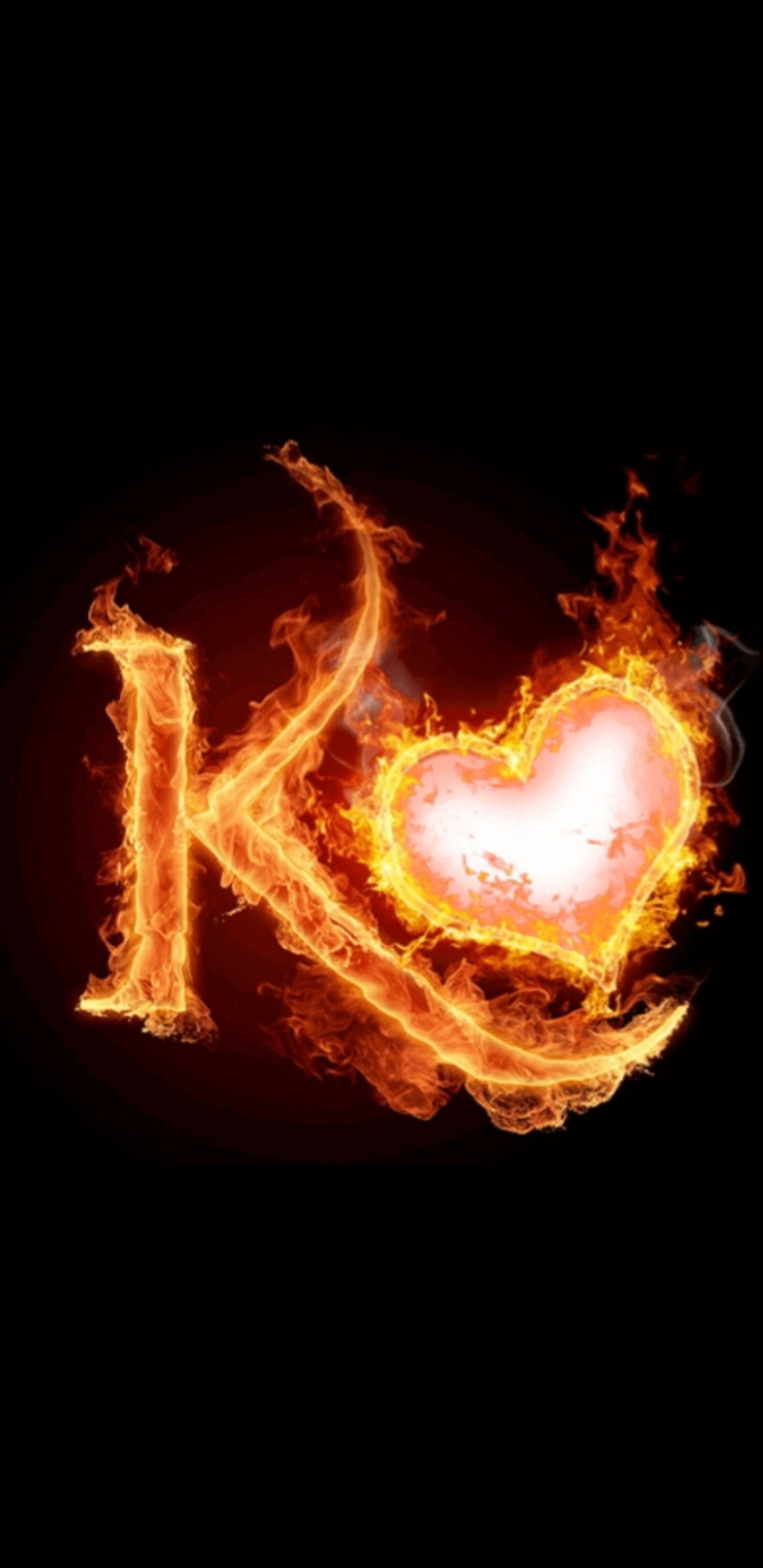 A close up of a fire heart with the word i love it (alphabet, letter, amour, fire, love)