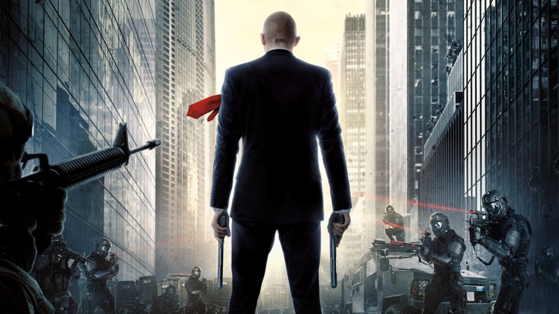 Крупный план человека в костюме с оружием. (агент 47, agent 47, киллер, кинопродюсер, перезагрузка)