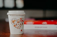 Enjoy a Cup of Happiness: Whimsical Take-Out Coffee Cup