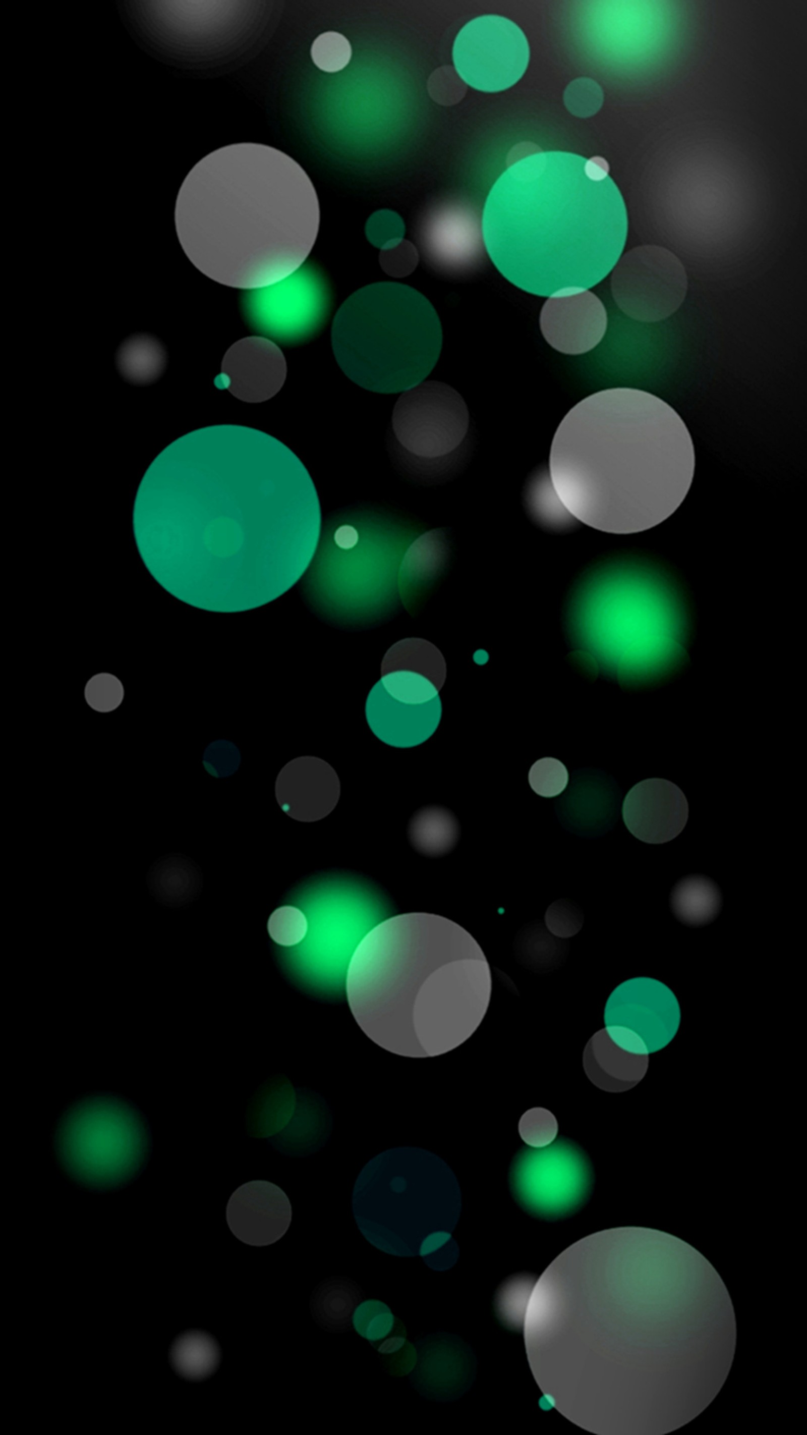 A close up of a cell phone with a green and white background (abstract, bokeh, bubbles, circles, green)