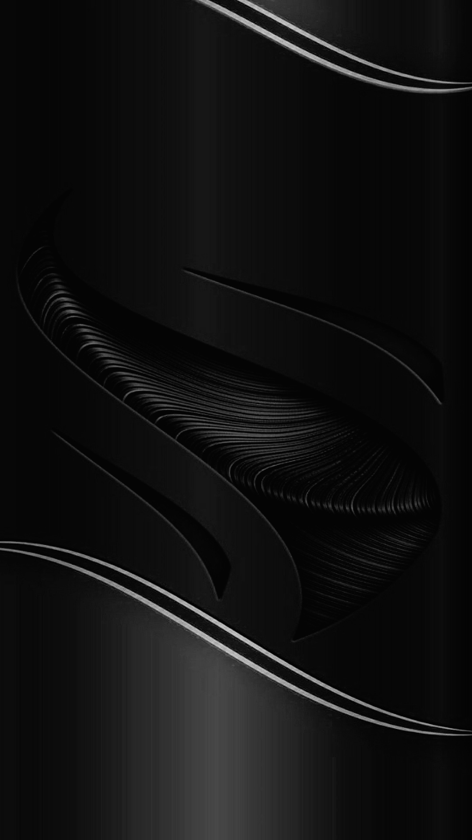 A black and white photo of a curved black background (black, black gold edge, dark, edge, grey)