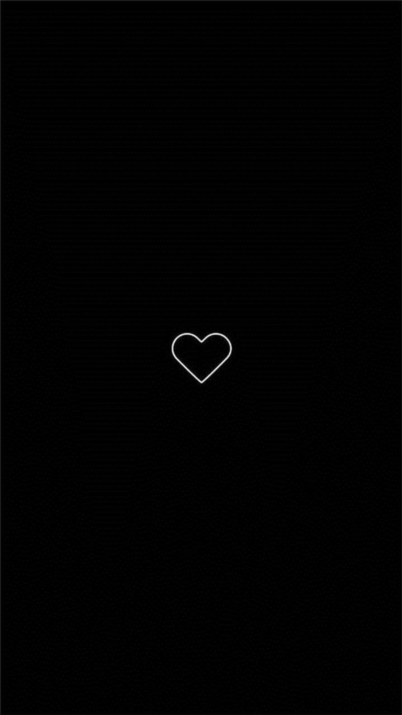 A close up of a heart on a black background (09090, 009900)