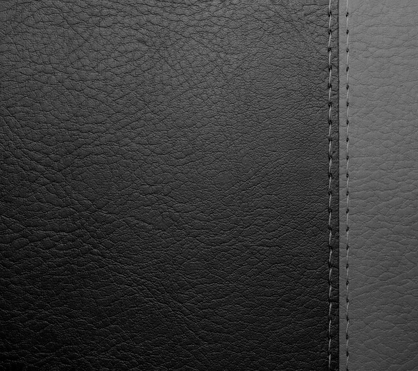 Gros plan d'une texture en cuir noir avec une fine bande (noir, gris, cuir, texture)