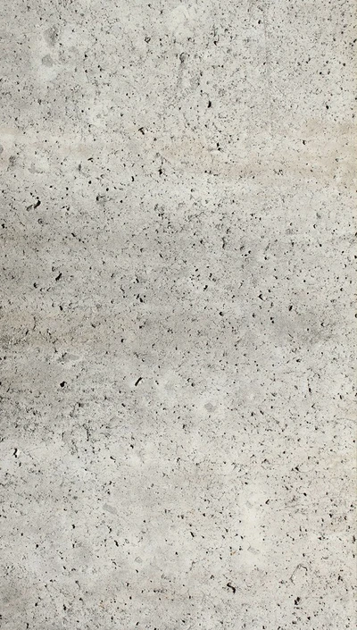 Abstract concrete texture with subtle variations and natural speckles.