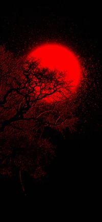 Crimson Dusk: A Tree Silhouette Against a Red Astronomical Sphere