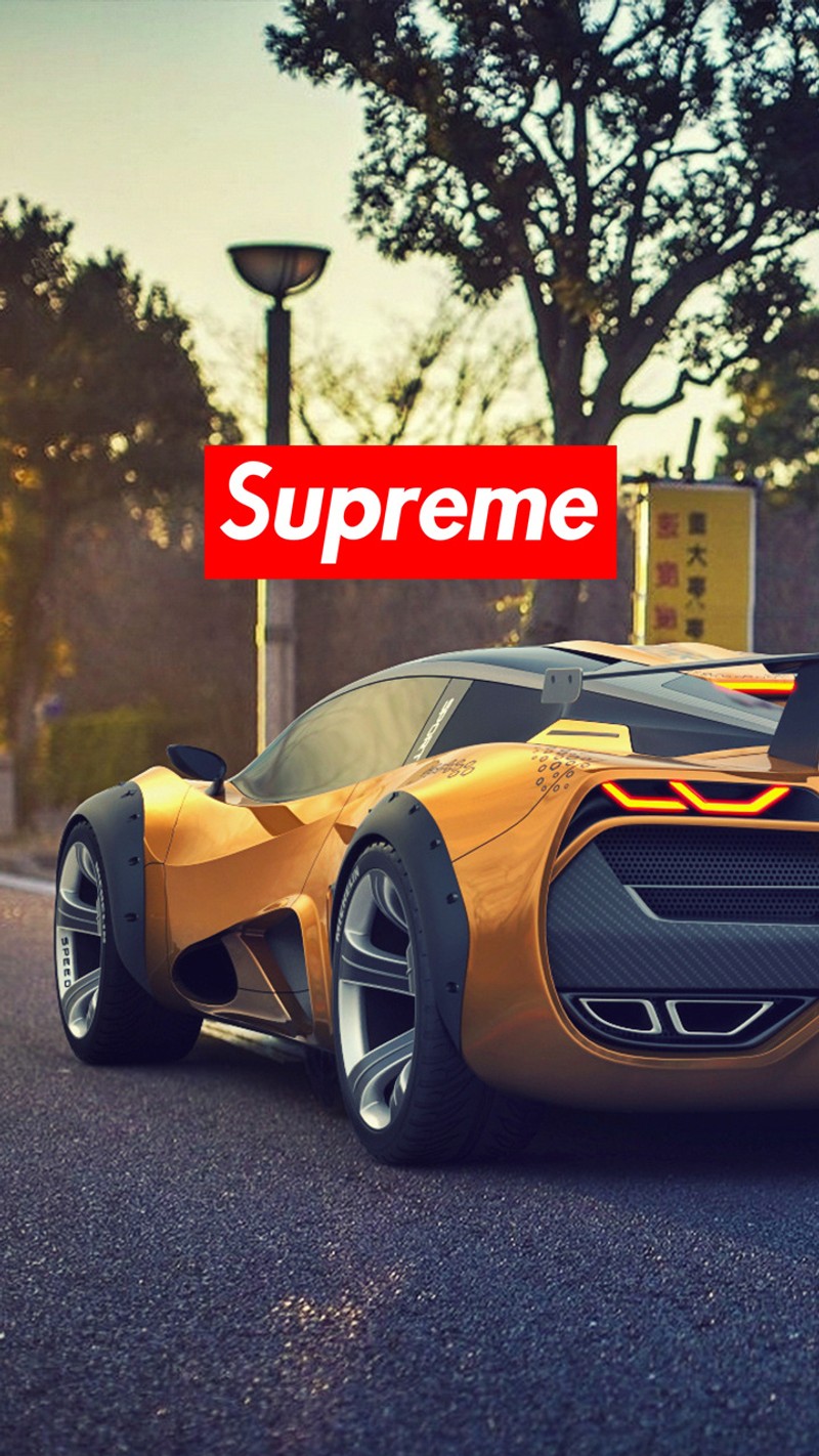 Близкий план желтого спортивного автомобиля с логотипом supreme (авто, машина, машины, deportive, логотип)