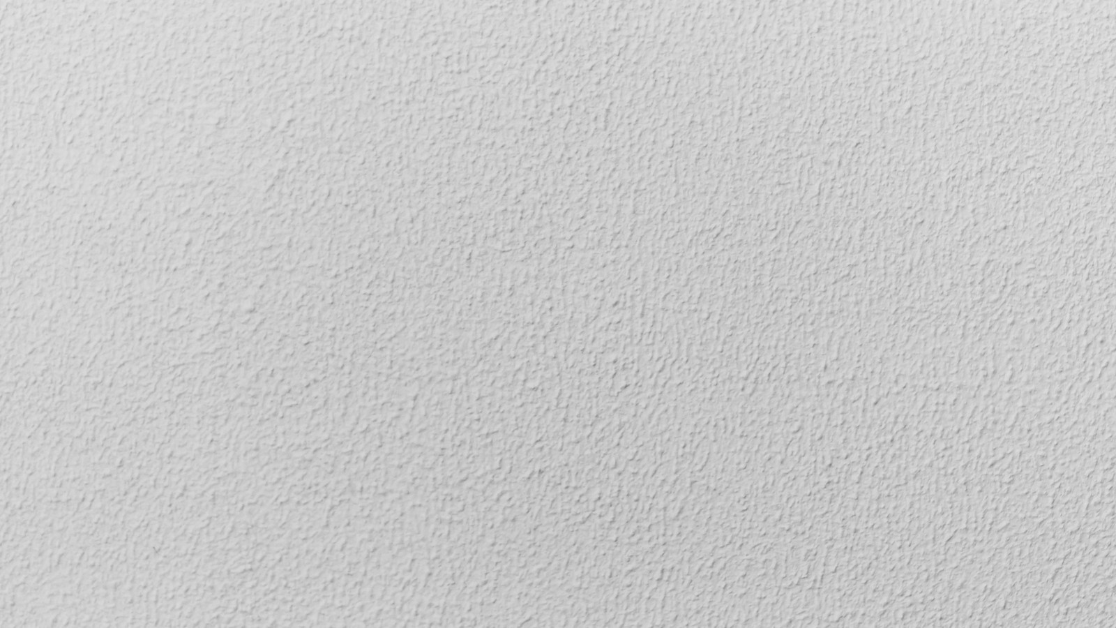 A close up of a white wall with a clock on it (textile, white, storm, polyester, line)