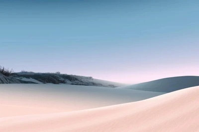 Serene Landschaft mit sanften Sanddünen unter einem blauen Himmel