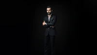 Virat Kohli: The Stylish Indian Cricketer in a Sleek Black Suit