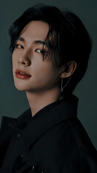 Hyunjin of Stray Kids: Charismatic Portrait in Dark Fashion