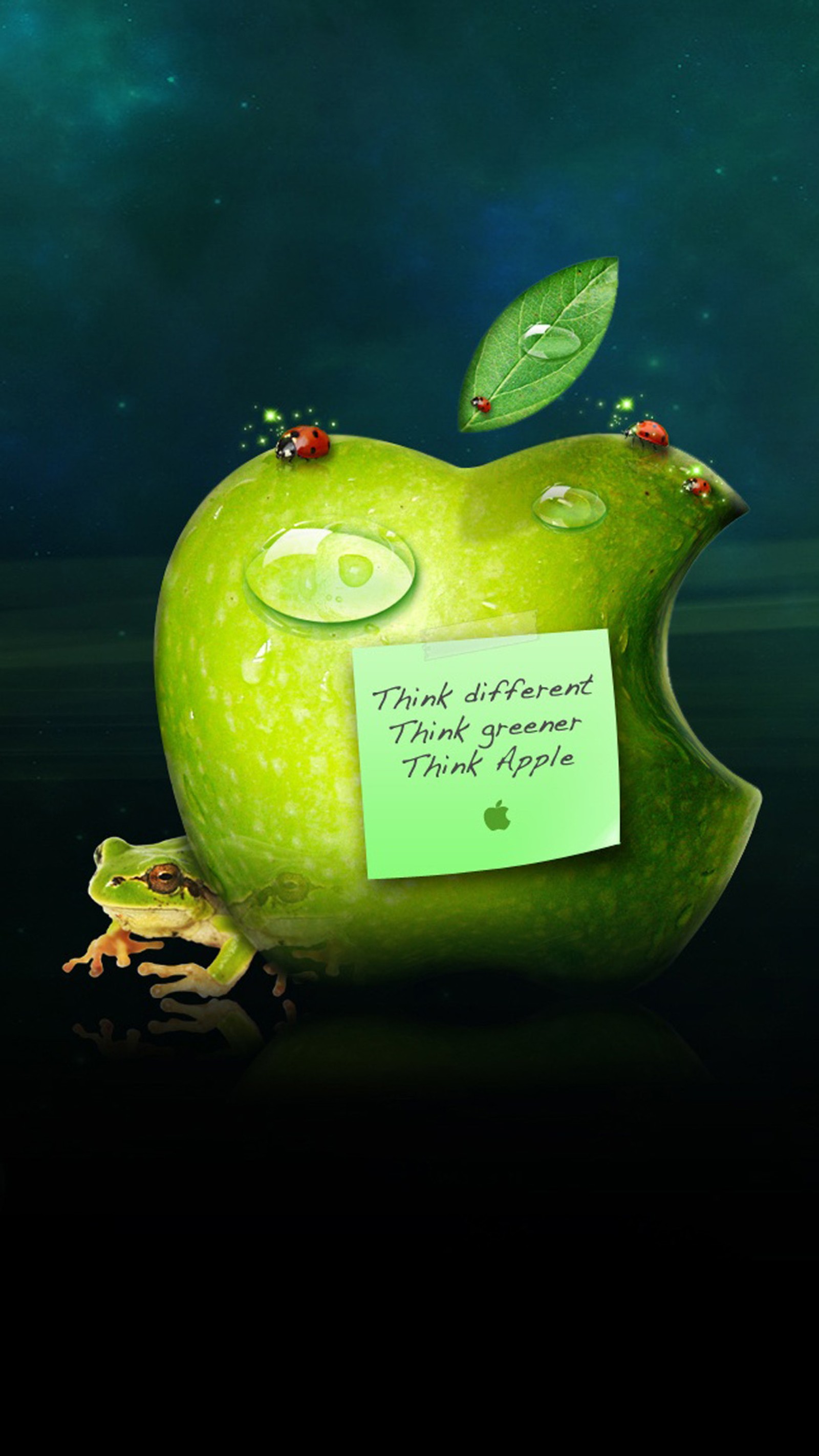 There is a green apple with a note stuck to it (apple, frog, green, insects, leave)