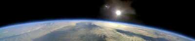 Earth's Atmosphere at Dawn: A Cosmic Panorama