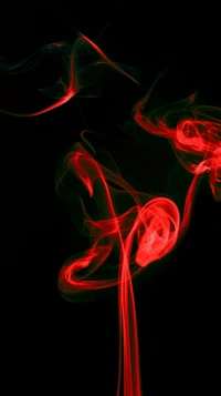 Red Smoke Swirls Against a Black Background