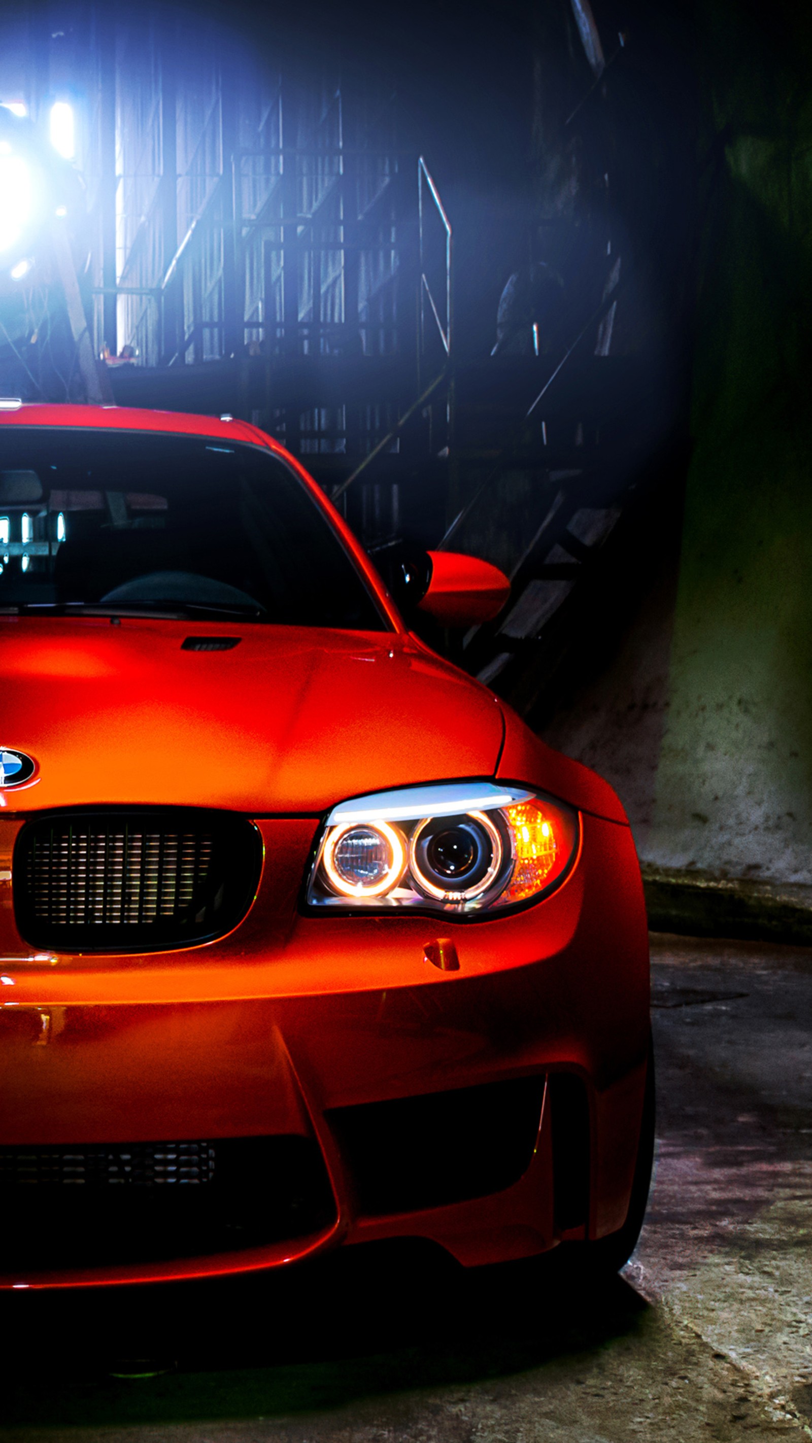 Bmw car in a garage with a bright light shining on it (bmw, car, engine, power, speed)