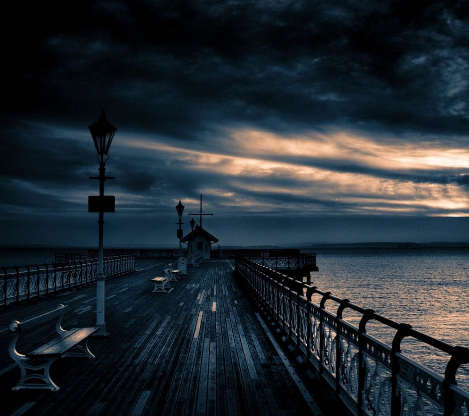 Arafed pier with benches and a lamp post on a cloudy day (bench, landscape, nature)