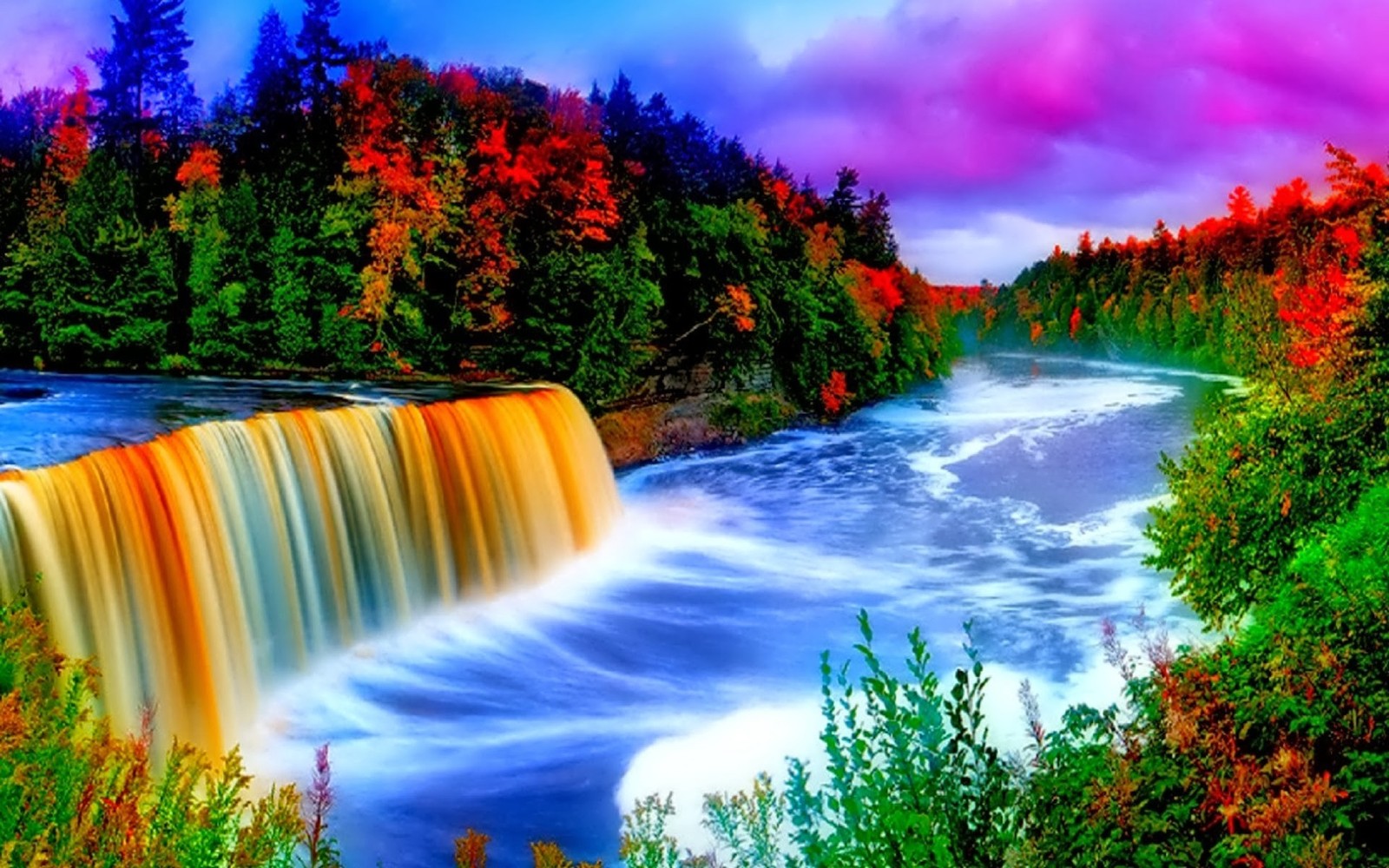 A large waterfall with a rainbow colored sky in the background (waterfall, nature, body of water, water, water resources)