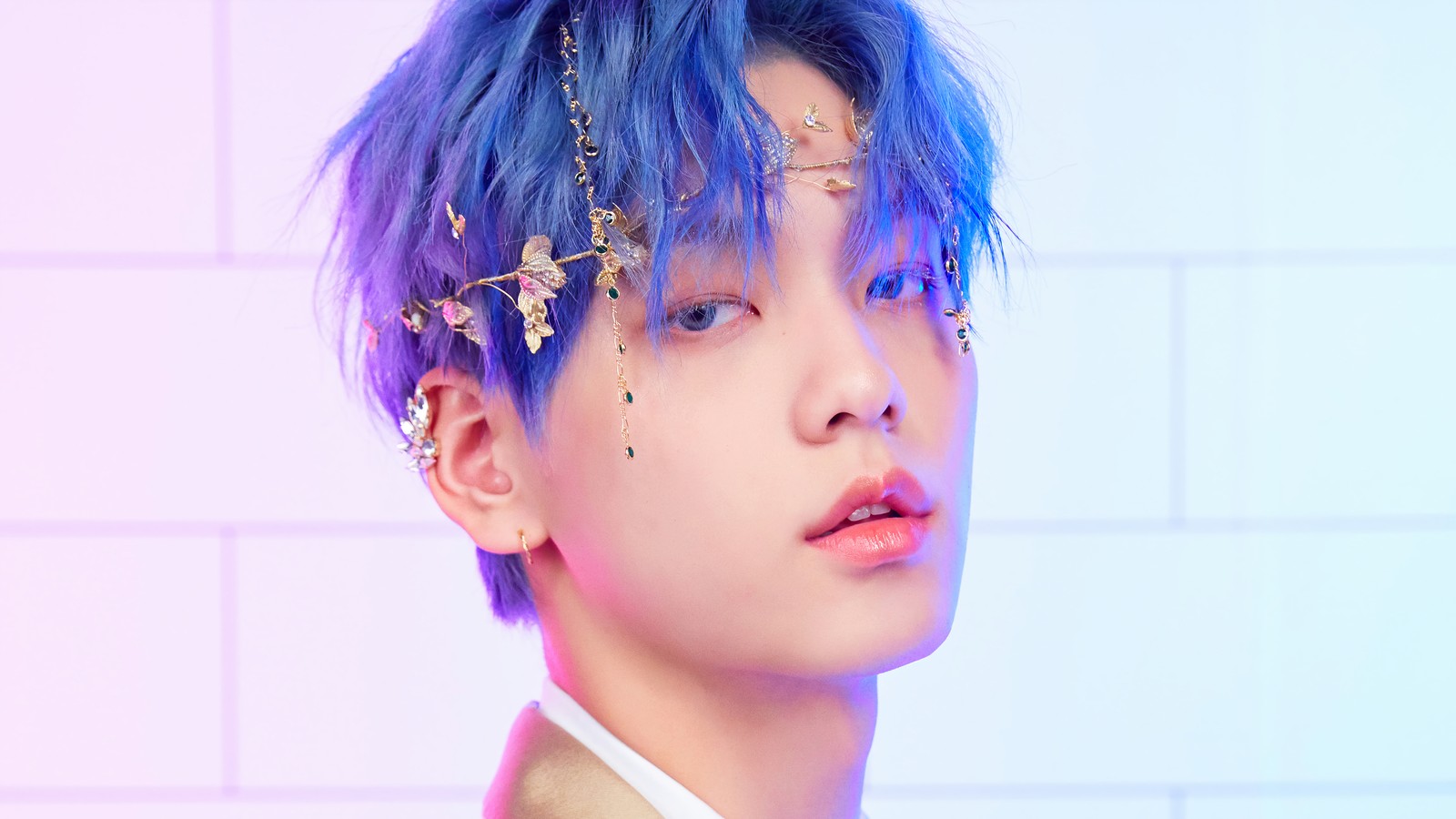 A close up of a person with blue hair and a white shirt (txt kpop, tomorrow x together, 투모로우바이투게더, kpop, k pop)