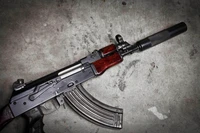 Fuzil de assalto AK-74 com supressor e carregador