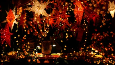 Festive Christmas Display with Illuminated Ornaments and Stars