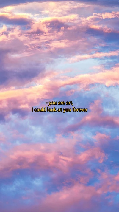 Dreamy Sky: Aesthetic Clouds in Blue and Pink with Artistic Text