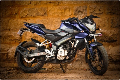 Sleek Motorcycle Against a Rustic Stone Wall