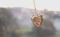 Golden Heart Locket Necklace Engraved with "Love