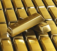 Stacks of gleaming gold bars, symbolizing wealth and prosperity.