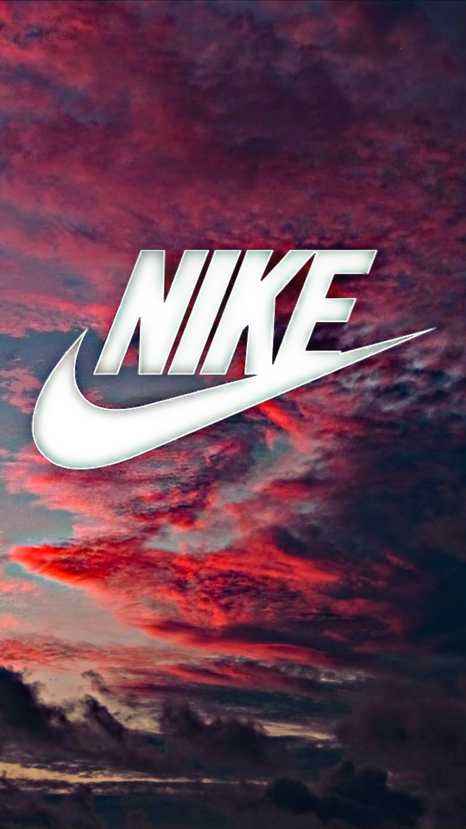 Logo de nike sobre un fondo de cielo al atardecer (logotipo, nike)