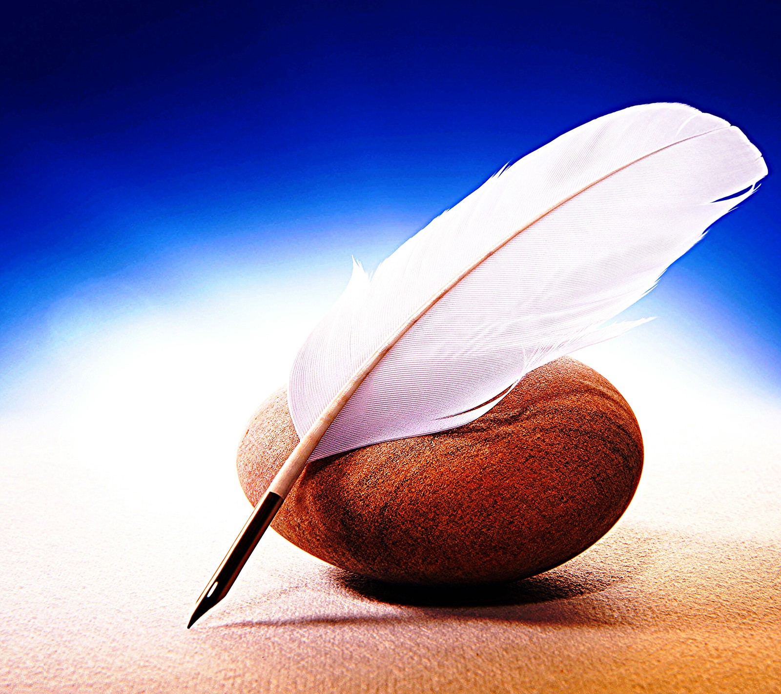 There is a feather quill and a pen on a wooden table (abstract, feather pen, pen)