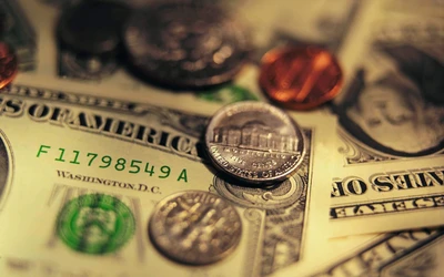 Close-up of US Currency and Coins for Financial Planning