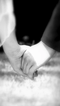 Intertwined Hands: A Symbol of Love and Commitment