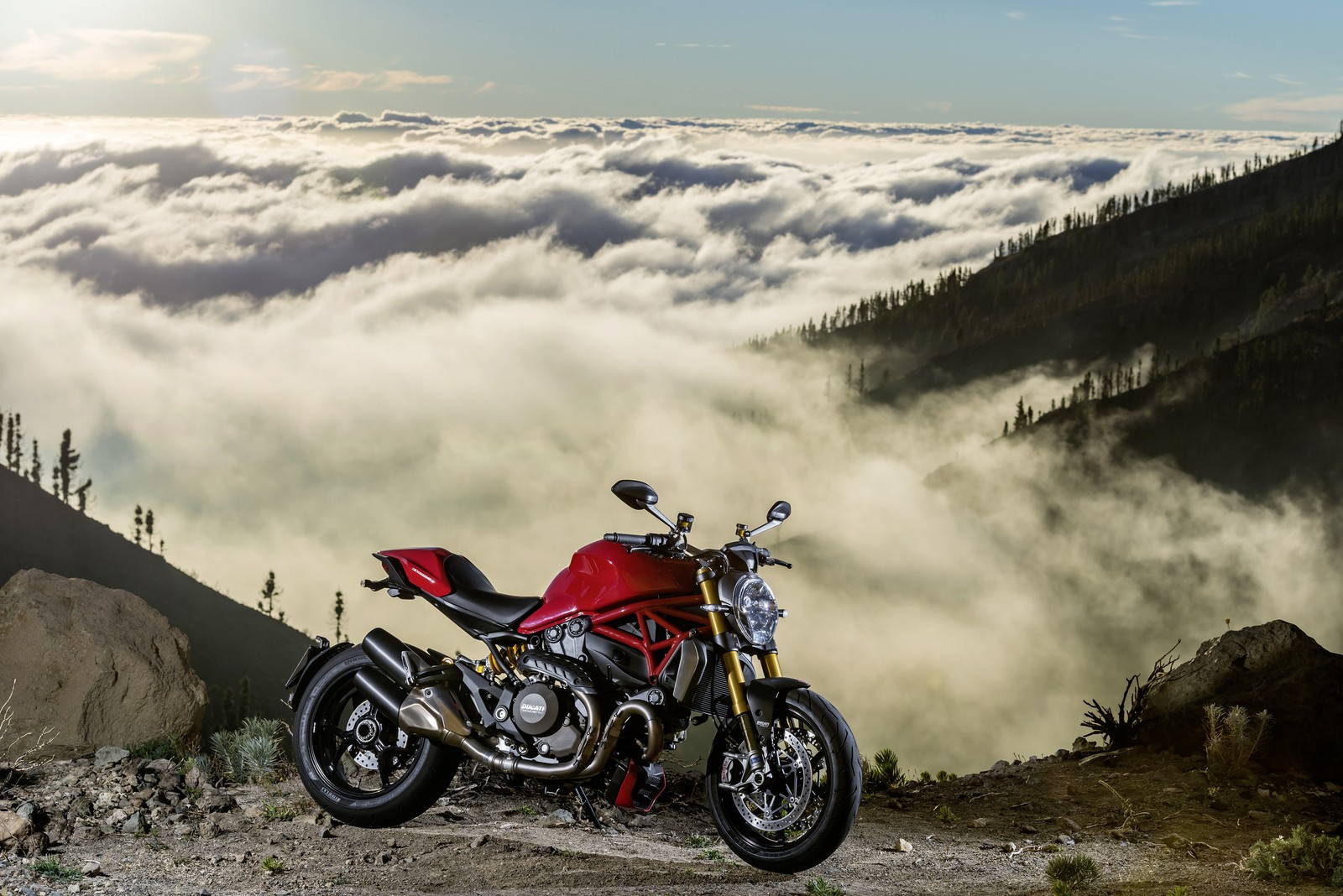 Arafed motorcycle parked on a rocky road with a view of the mountains (motorcycle, ducati, sport bike, ducati monster 696, mountainous landforms)