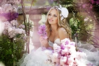 Bridal Beauty Amidst Lilac Blossoms