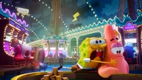 Bob Esponja y Patricio disfrutando de una divertida noche en el casino en "La película de Bob Esponja: Un héroe fuera del agua