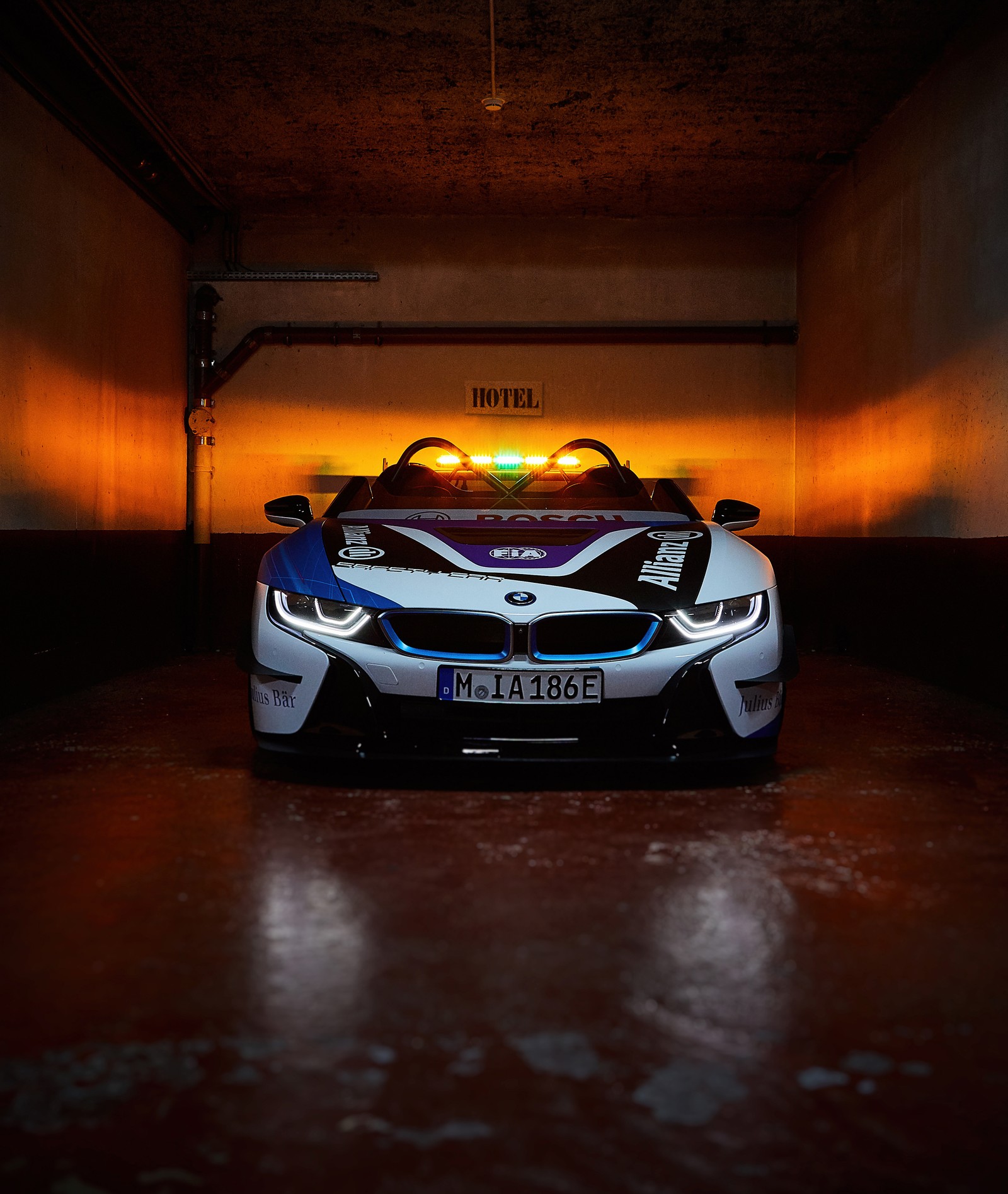 Arafed white sports car with a police light on top (bmw i8 roadster, formula e racing car, cars, 4k wallpaper)