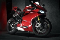 Ducati Panigale 1199 Superbike en rouge frappant avec carénage éclairé.