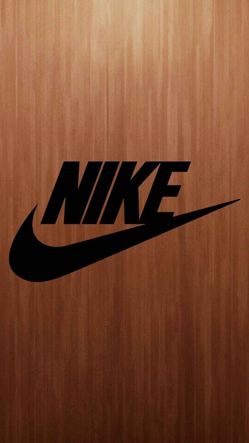 Крупный план деревянной стены с логотипом nike (логотип, логотипы, марка, nike)