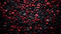 Artistic Composition of Dark Red and Black Volcanic Pebbles