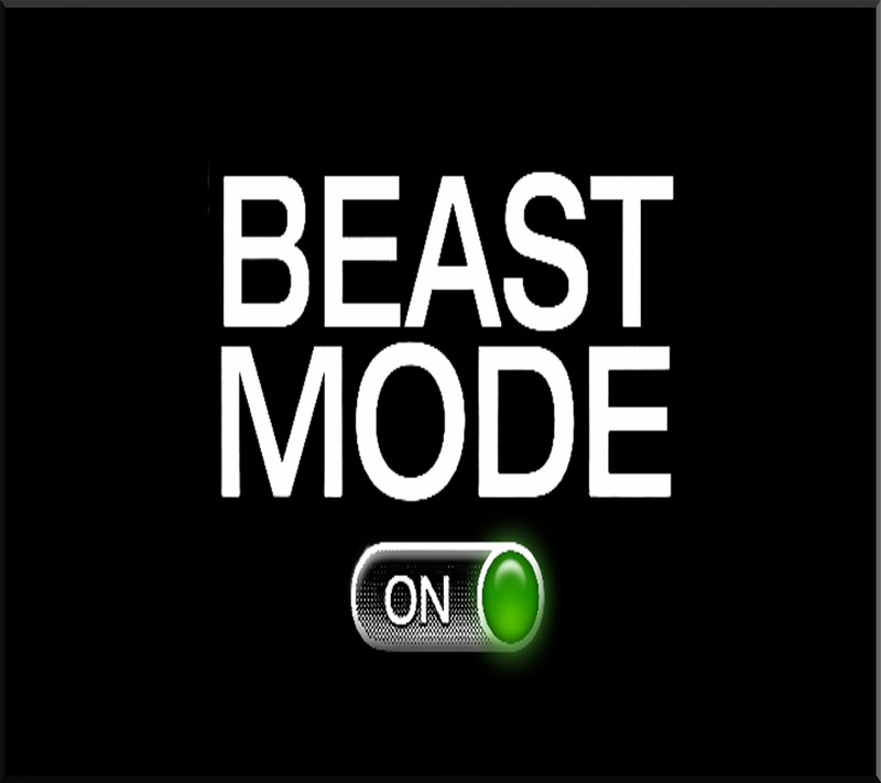 Близкий план кнопки на черном фоне с надписью beast mode (цитаты, поговорка)