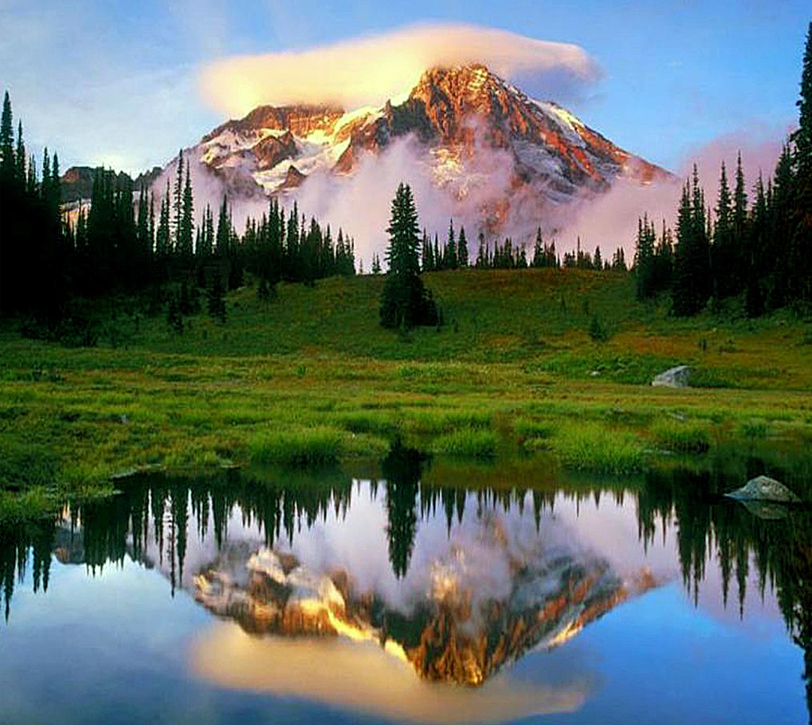 Arafed mountain with a reflection in a lake in the foreground (nature, wallpaper)