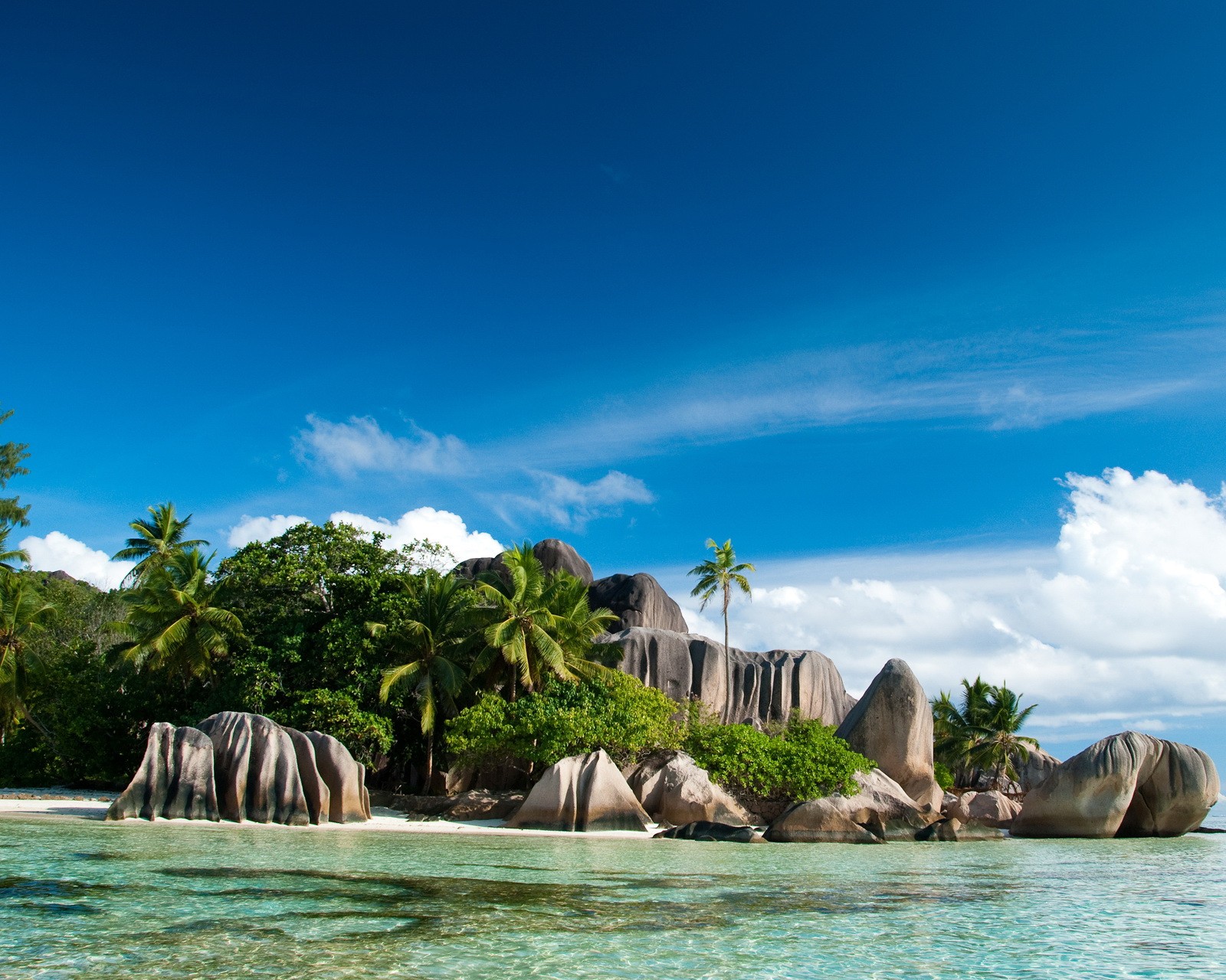 Arafly view of a tropical island with a waterfall and palm trees (beach, galaxy, hd, mountains, nature)