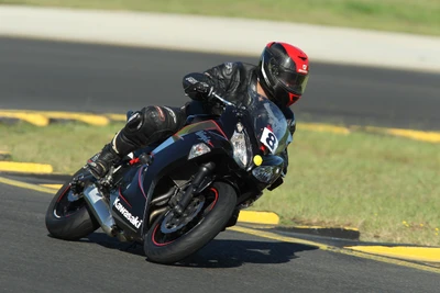 Kawasaki Ninja Sport Bike in Action on the Race Track