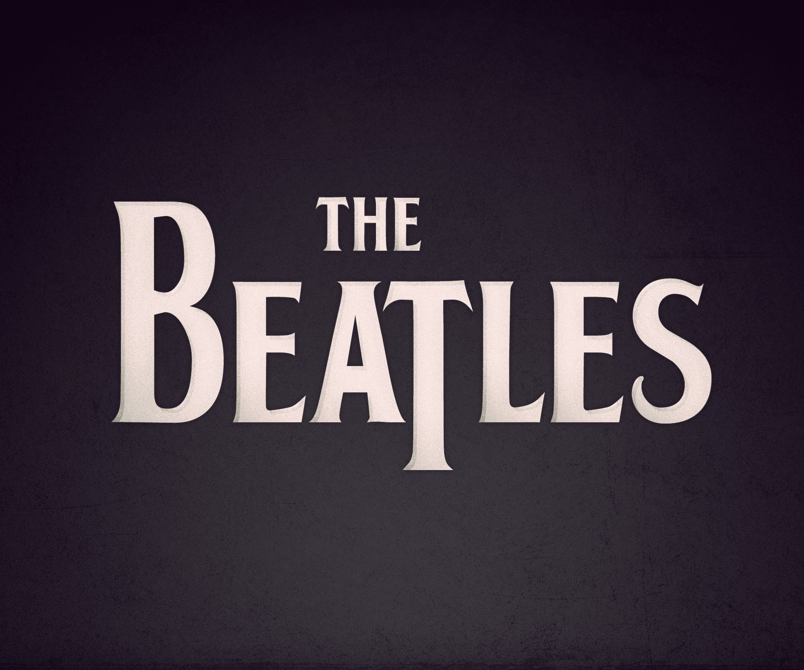 The beatles logo on a black background (meem, rubab)