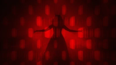 Silhouette of the Scarlet Witch Against a Dark Red Background