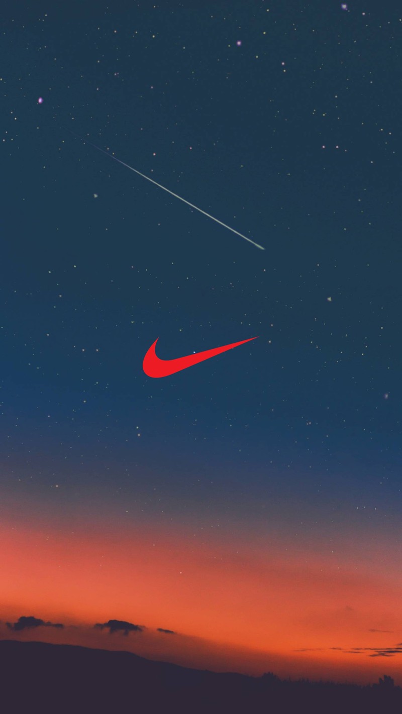 Близкий план красного логотипа nike на фоне неба (природа, nike, закат)