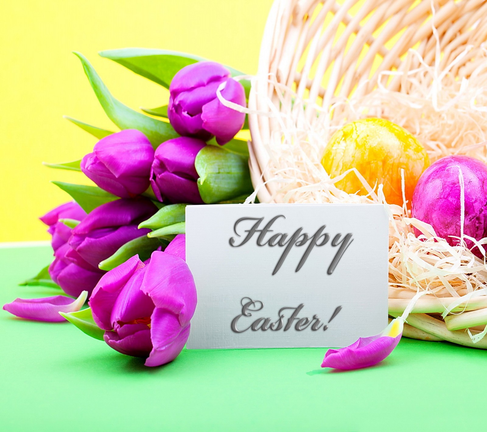 Purple tulips and eggs in a basket with a happy easter sign (easter, eggs, spring, tulips)